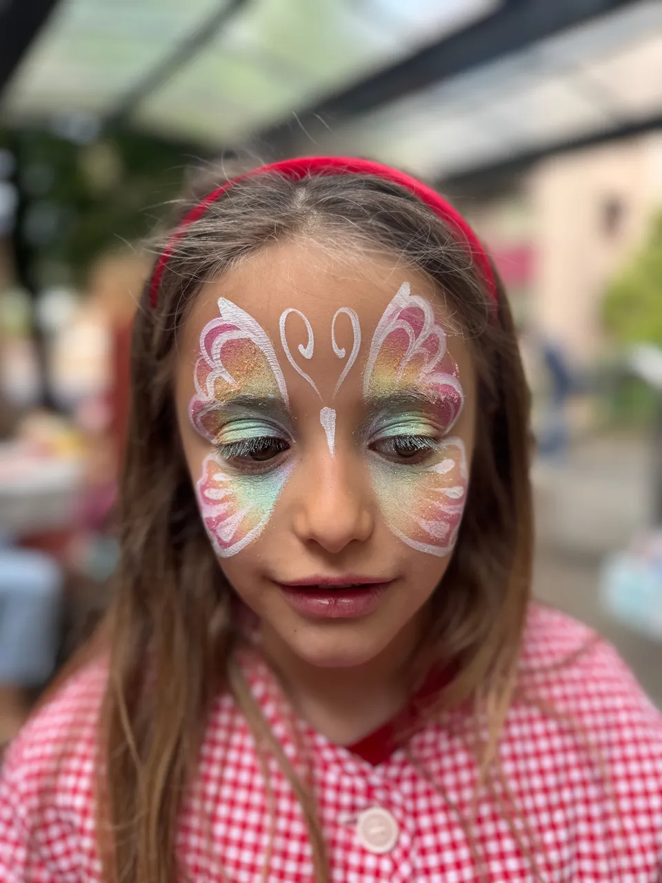 Papillon pastel sur les yeux